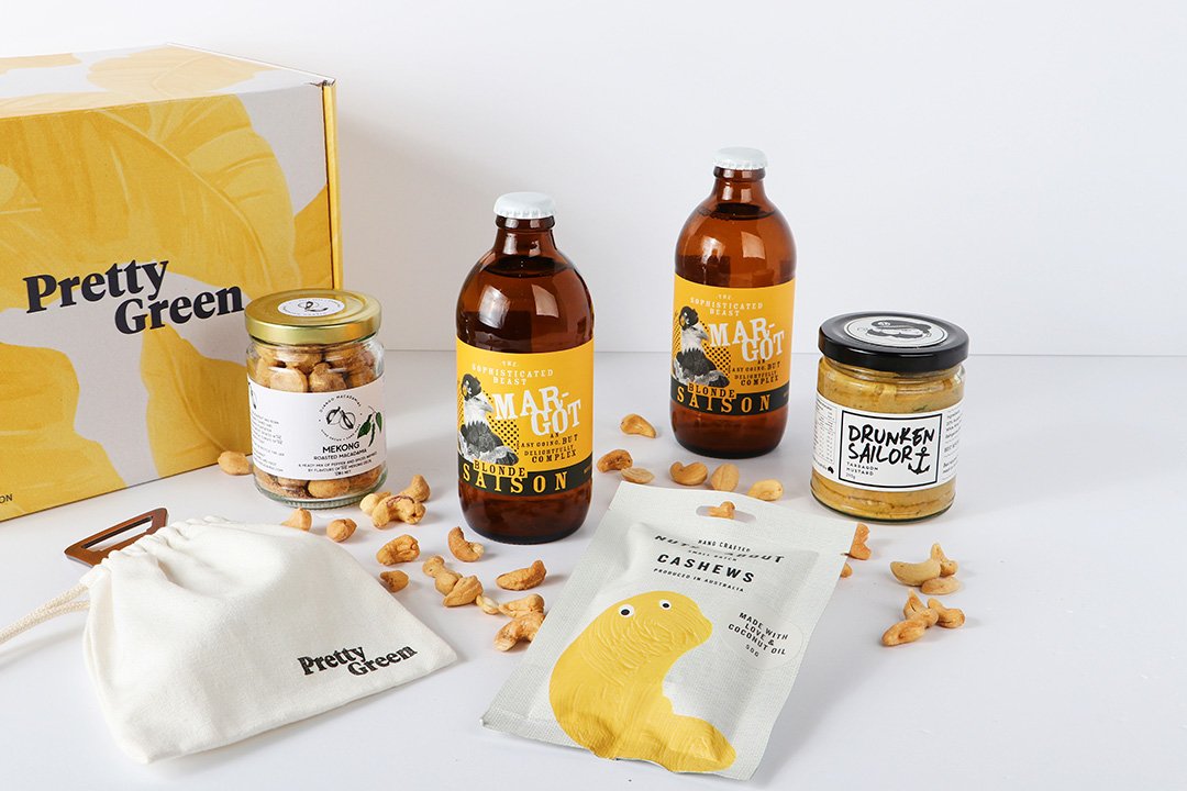 Beers and nuts hamper with a yellow Pretty Green box