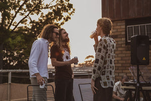 Group of mates having fun and celebrating at a party